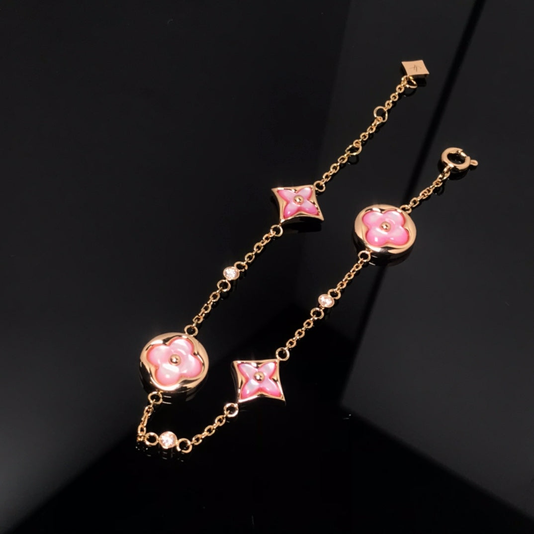STAR AND SUN 4 MOTIF PINK MOP PINK GOLD BRACELET VIP