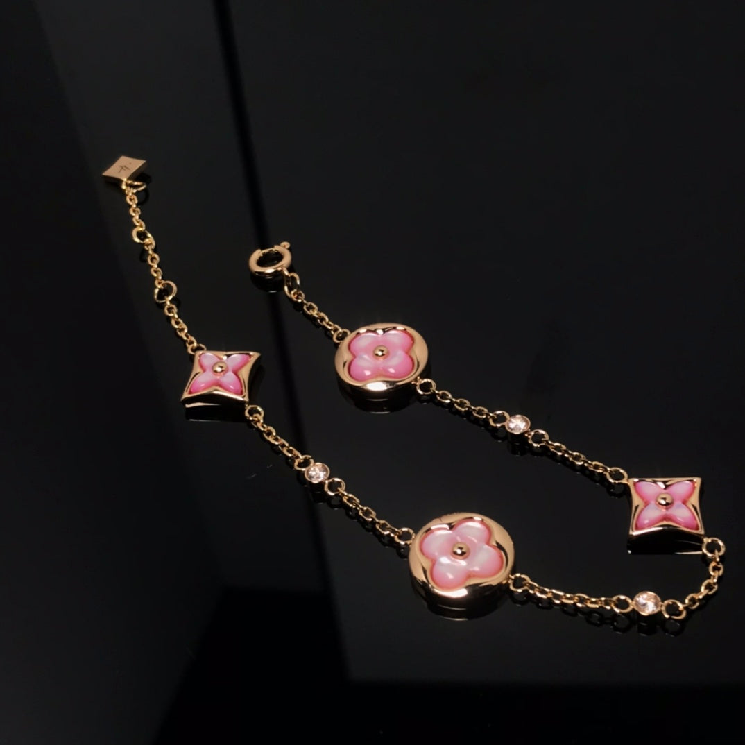 STAR AND SUN 4 MOTIF PINK MOP PINK GOLD BRACELET VIP
