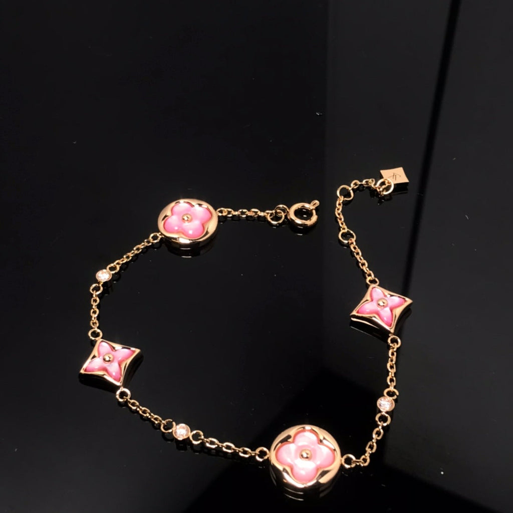 STAR AND SUN 4 MOTIF PINK MOP PINK GOLD BRACELET VIP