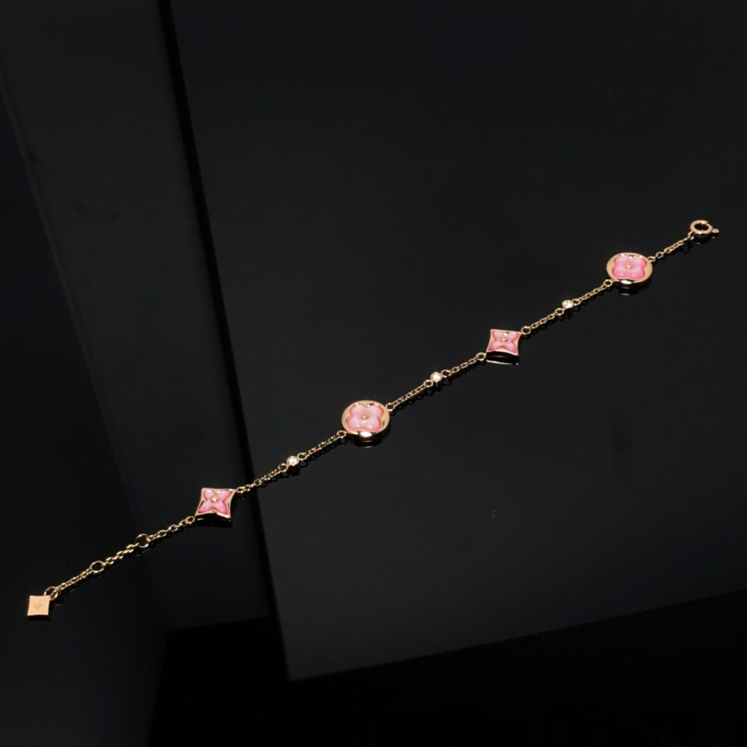 STAR AND SUN 4 MOTIF PINK MOP PINK GOLD BRACELET VIP