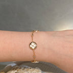 STAR AND SUN 4 MOTIF WHITE MOP PINK GOLD BRACELET VIP