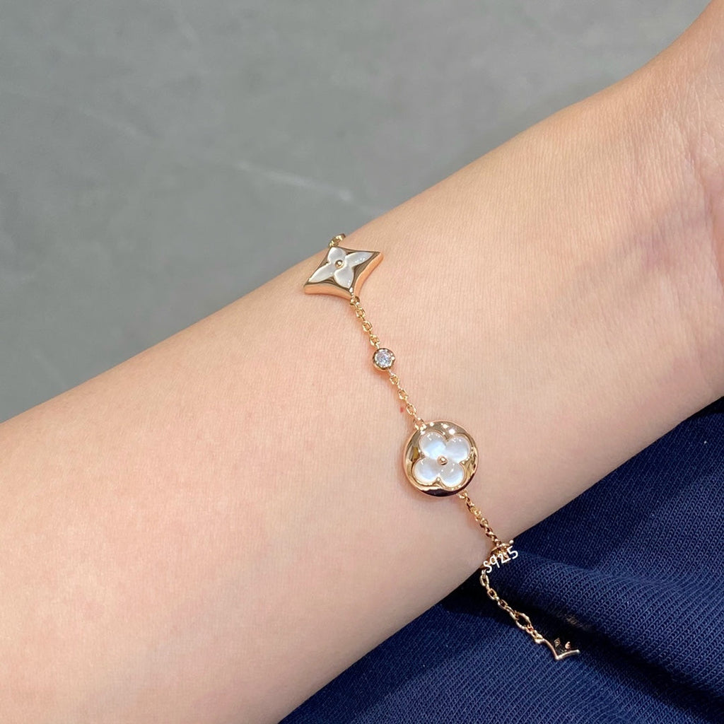 STAR AND SUN 4 MOTIF WHITE MOP PINK GOLD BRACELET VIP