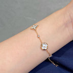 STAR AND SUN 4 MOTIF WHITE MOP PINK GOLD BRACELET VIP