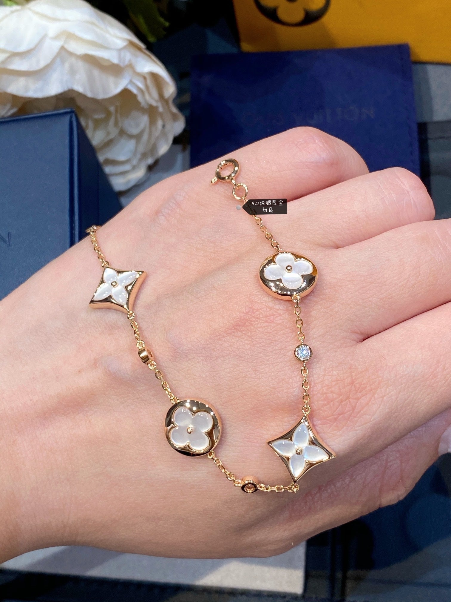 STAR AND SUN 4 MOTIF WHITE MOP PINK GOLD BRACELET VIP