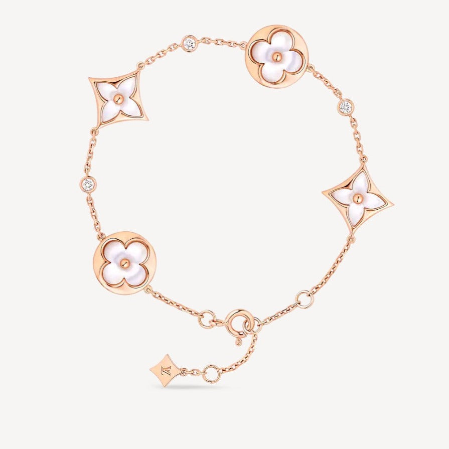 STAR AND SUN 4 MOTIF WHITE MOP PINK GOLD BRACELET VIP