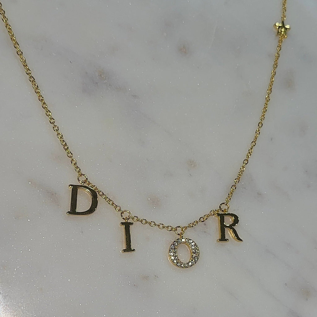 Exclusive Gold DR Necklace
