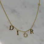 Exclusive Gold DR Necklace